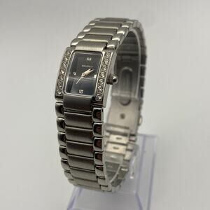 Elegant Ladies Regency Silver Tone Watch Black Dial Crystal Bezel